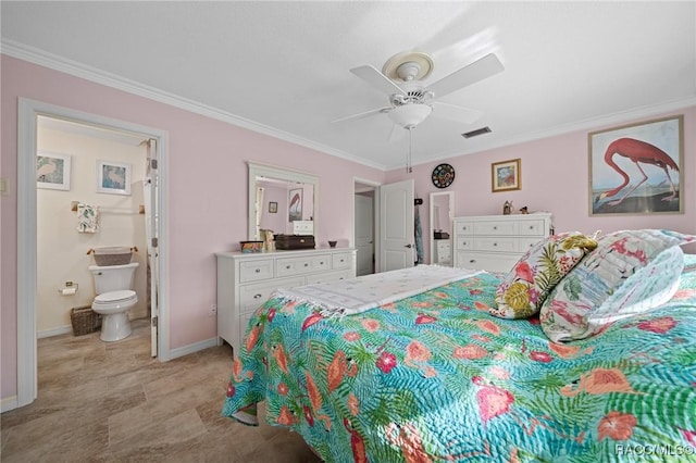 bedroom featuring baseboards, crown molding, ceiling fan, and ensuite bathroom