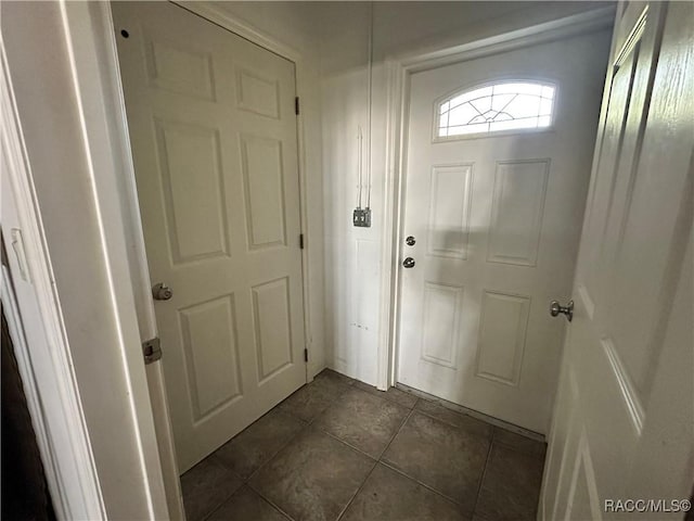 1203 SE Kings Bay Dr, Crystal River, FL 34429 - doorway featuring dark tile patterned flooring