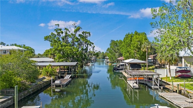 1203 SE Kings Bay Dr, Crystal River, FL 34429 - dock area with a water view and boat lift
