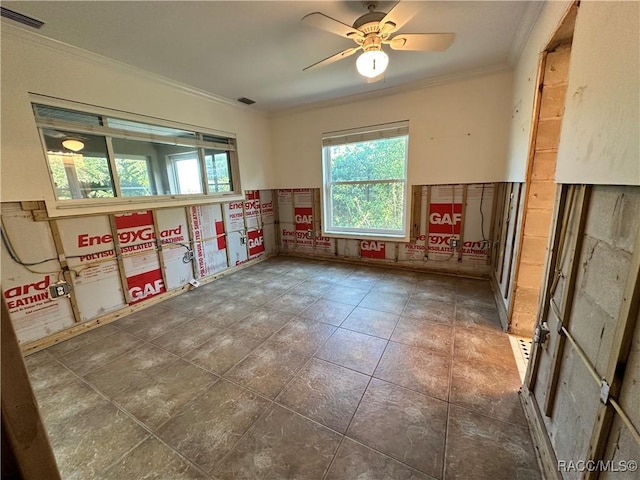 1203 SE Kings Bay Dr, Crystal River, FL 34429 - spare room featuring ceiling fan, ornamental molding, and visible vents