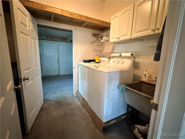 1203 SE Kings Bay Dr, Crystal River, FL 34429 - laundry area with a sink, washer and clothes dryer, and cabinet space