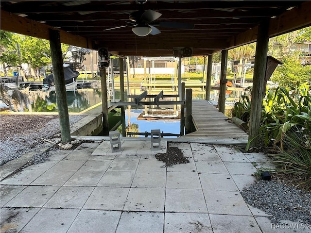 1203 SE Kings Bay Dr, Crystal River, FL 34429 - dock area featuring boat lift and a water view