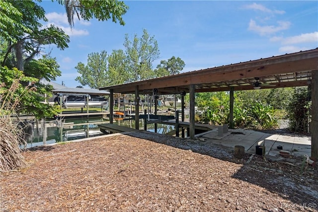 1203 SE Kings Bay Dr, Crystal River, FL 34429 - view of dock featuring boat lift