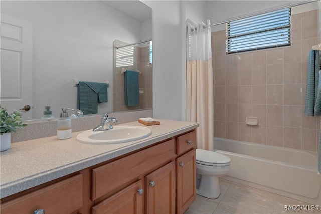 full bath with toilet, shower / bathtub combination with curtain, vanity, and tile patterned floors