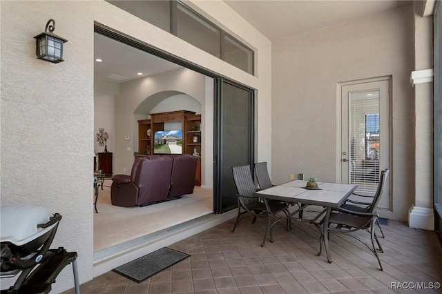 view of patio with outdoor dining area