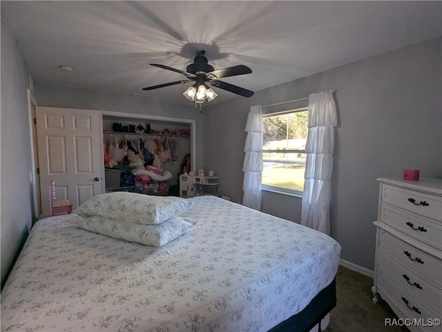 bedroom with a closet, ceiling fan, and dark colored carpet