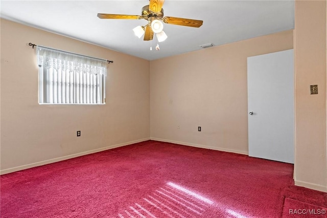 carpeted empty room with ceiling fan