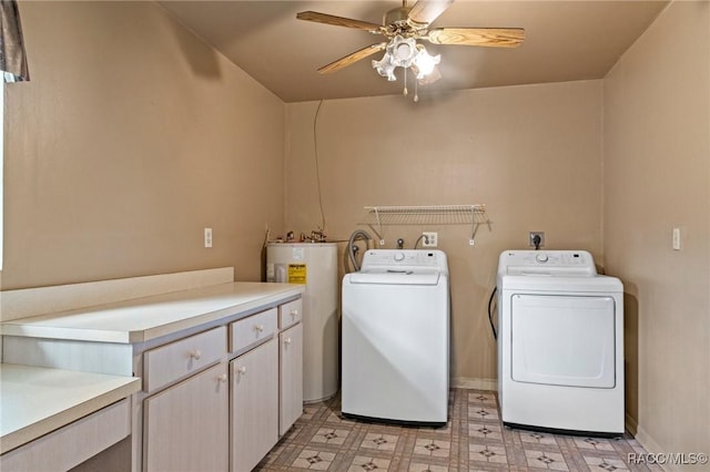 clothes washing area with cabinets, electric water heater, washing machine and clothes dryer, and ceiling fan