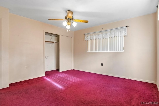 unfurnished bedroom with carpet flooring, ceiling fan, and a closet