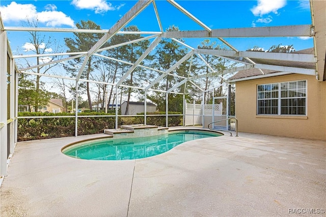 outdoor pool featuring a lanai and a patio area