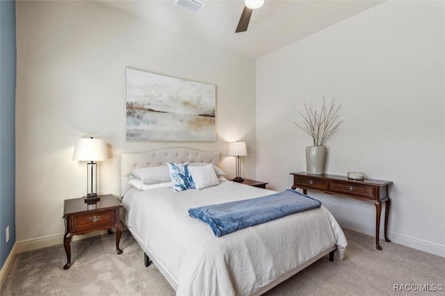 bedroom featuring carpet floors, baseboards, visible vents, and a ceiling fan