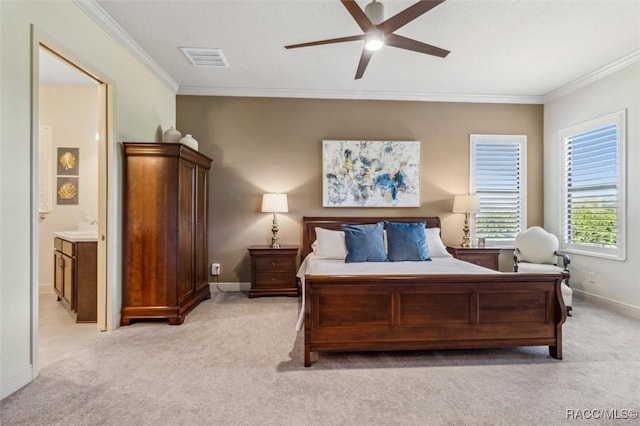 bedroom featuring crown molding, visible vents, and light colored carpet