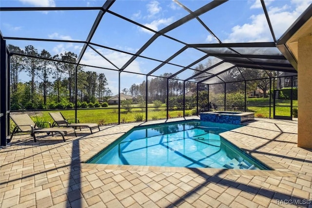 view of pool featuring a patio, a lanai, and a pool with connected hot tub