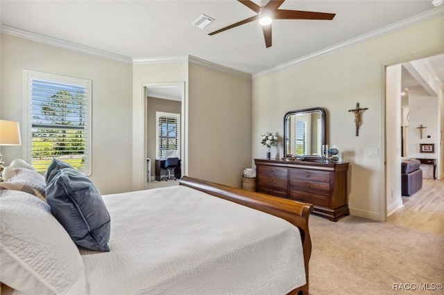 bedroom with ornamental molding, light colored carpet, visible vents, and baseboards