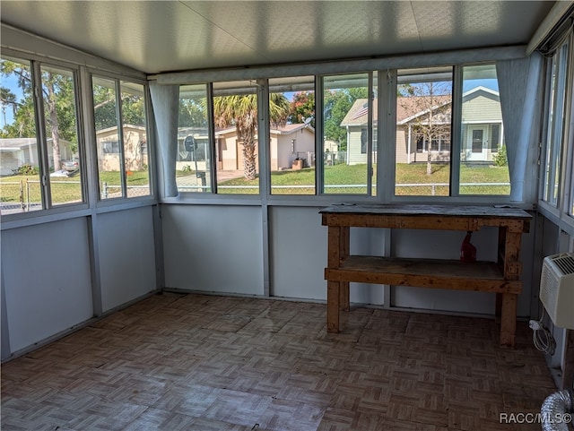 unfurnished sunroom with a healthy amount of sunlight