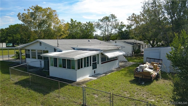 rear view of house with a shed