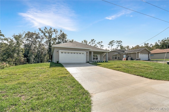 ranch-style house with a garage and a front lawn