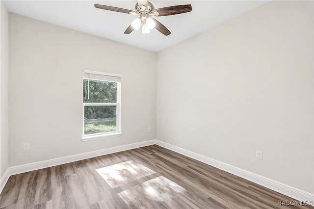 unfurnished room with light hardwood / wood-style floors and ceiling fan