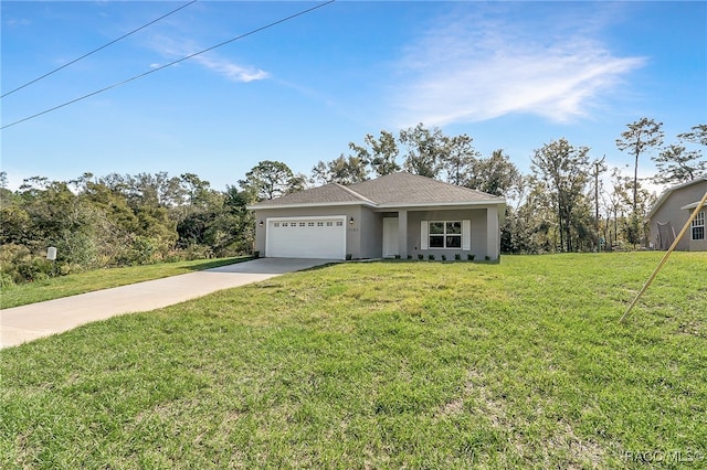 ranch-style house featuring a front yard and a garage