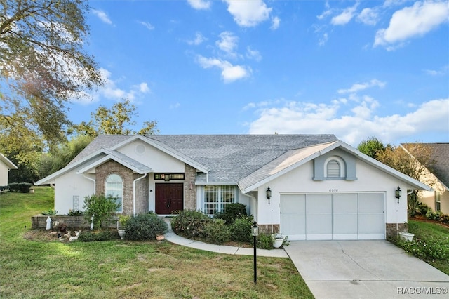 ranch-style home featuring a front yard and a garage