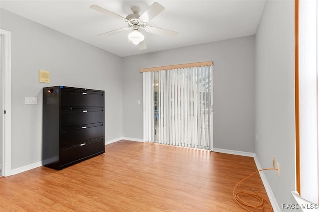 unfurnished room with ceiling fan and light hardwood / wood-style flooring