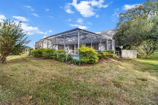 view of yard featuring a lanai