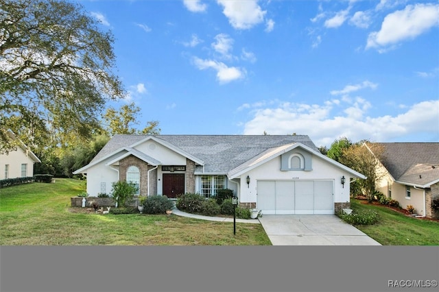 ranch-style house featuring a garage and a front lawn