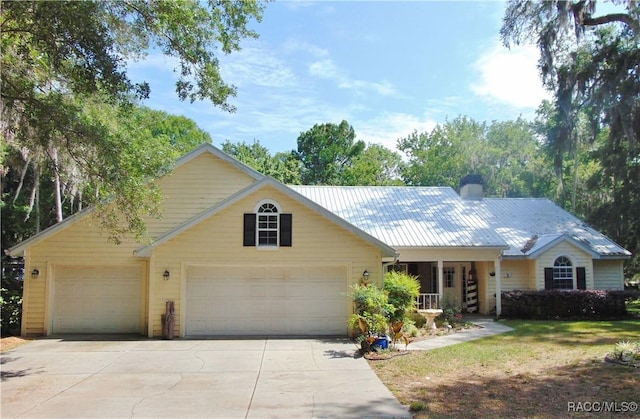 single story home with a garage