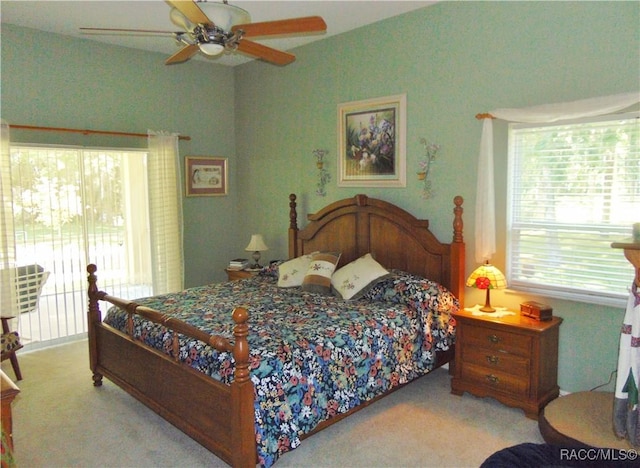 bedroom featuring ceiling fan and light colored carpet