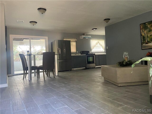 11 S Tyler St, Beverly Hills, FL 34465 - living area featuring healthy amount of natural light