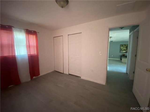 11 S Tyler St, Beverly Hills, FL 34465 - unfurnished bedroom with dark wood finished floors and baseboards