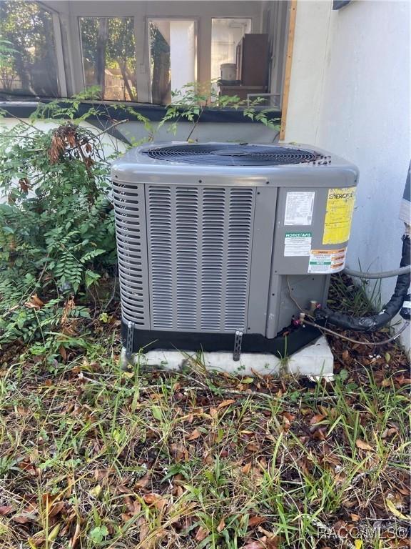 11 S Tyler St, Beverly Hills, FL 34465 - exterior view of a central air condition unit