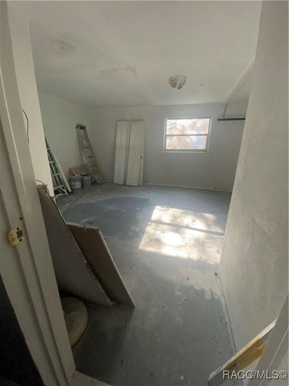 interior space with concrete flooring