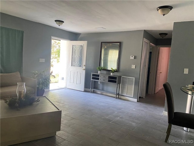 11 S Tyler St, Beverly Hills, FL 34465 - living room with dark wood-type flooring and baseboards