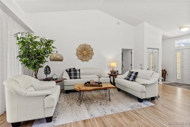 6150 N Whispering Oak Loop, Beverly Hills, FL 34465 - living room with wood finished floors and vaulted ceiling