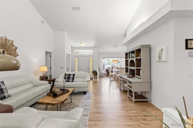 6150 N Whispering Oak Loop, Beverly Hills, FL 34465 - living area featuring light wood-style floors
