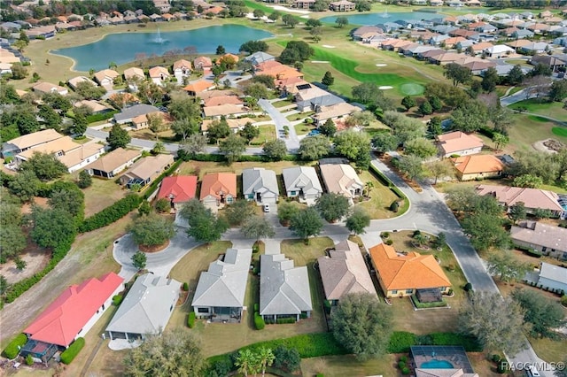 birds eye view of property featuring a water view and a residential view