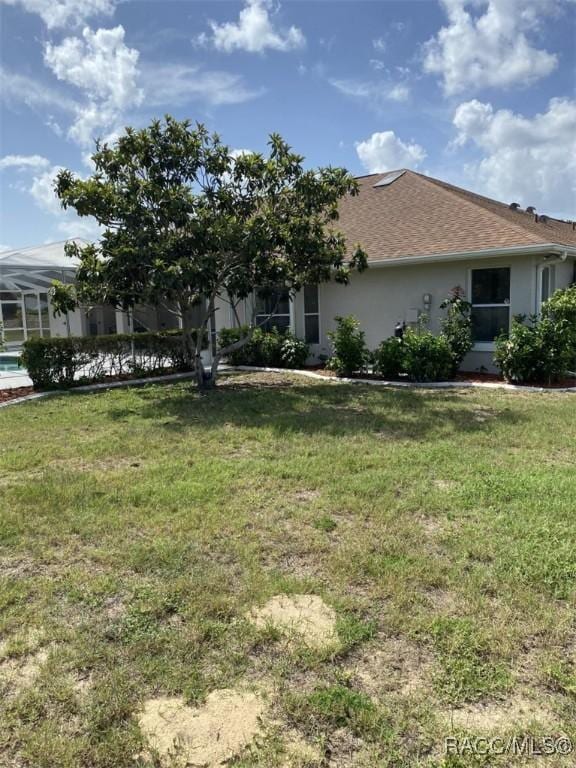259 N Cherry Pop Dr, Inverness, FL 34453 - view of front of home with stucco siding and a front yard