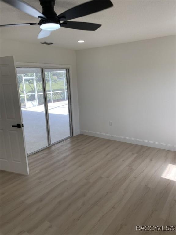259 N Cherry Pop Dr, Inverness, FL 34453 - spare room featuring light wood-type flooring, baseboards, recessed lighting, and a ceiling fan