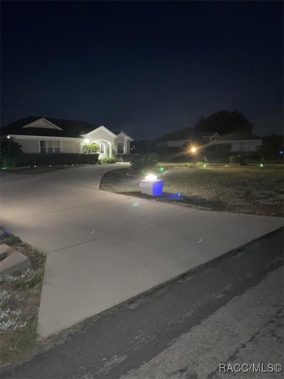259 N Cherry Pop Dr, Inverness, FL 34453 - view of front of property with concrete driveway