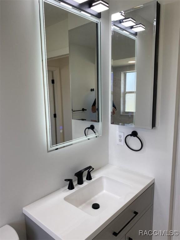 259 N Cherry Pop Dr, Inverness, FL 34453 - bathroom featuring vanity and toilet