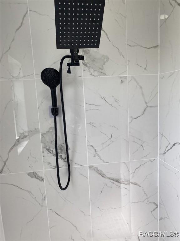259 N Cherry Pop Dr, Inverness, FL 34453 - bathroom view of a marble finish shower