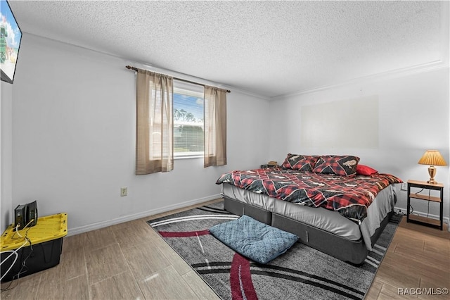 bedroom featuring a textured ceiling