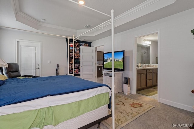 bedroom with light colored carpet, visible vents, ornamental molding, connected bathroom, and baseboards