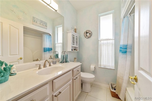 full bathroom with tile patterned floors, vanity, shower / bath combination with curtain, and toilet