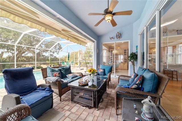 sunroom featuring vaulted ceiling