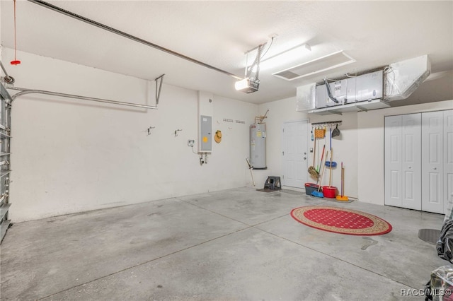 2459 N Brentwood Cir, Lecanto, FL 34461 - garage with water heater, electric panel, and a garage door opener