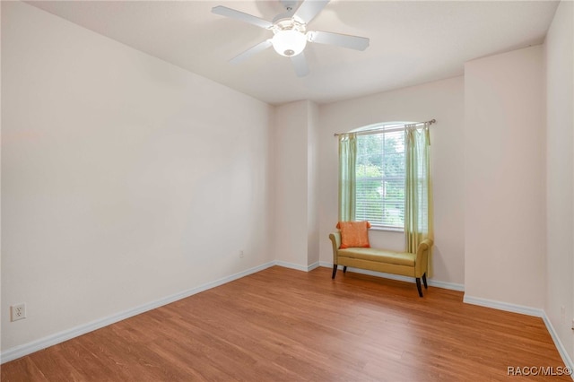 2459 N Brentwood Cir, Lecanto, FL 34461 - living area featuring light wood-type flooring and ceiling fan