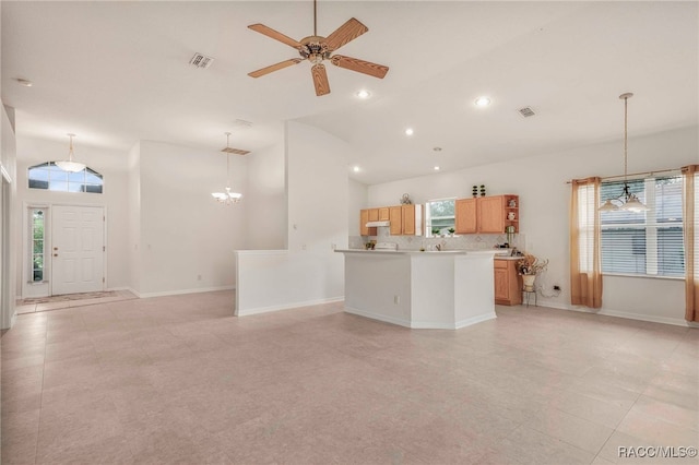 2459 N Brentwood Cir, Lecanto, FL 34461 - living area with a chandelier, high vaulted ceiling, ceiling fan, and recessed lighting