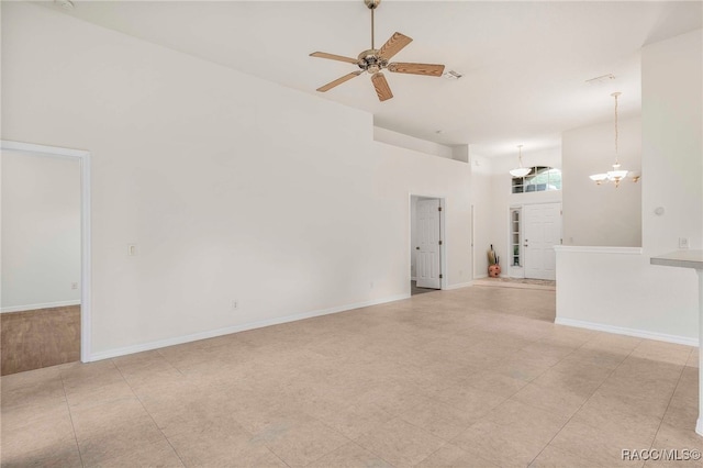 2459 N Brentwood Cir, Lecanto, FL 34461 - unfurnished living room with a ceiling fan and a chandelier